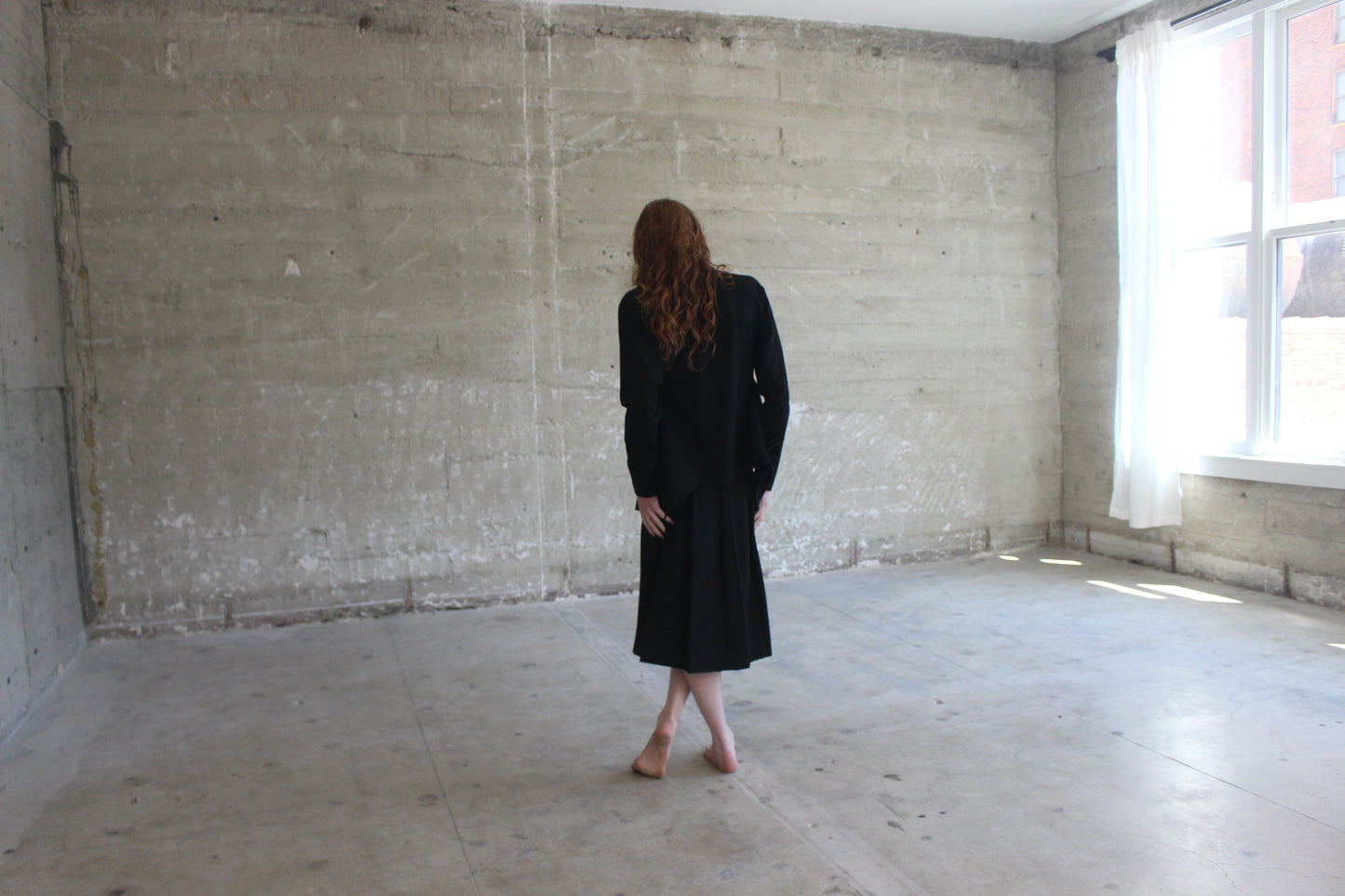 black jacket and skirt