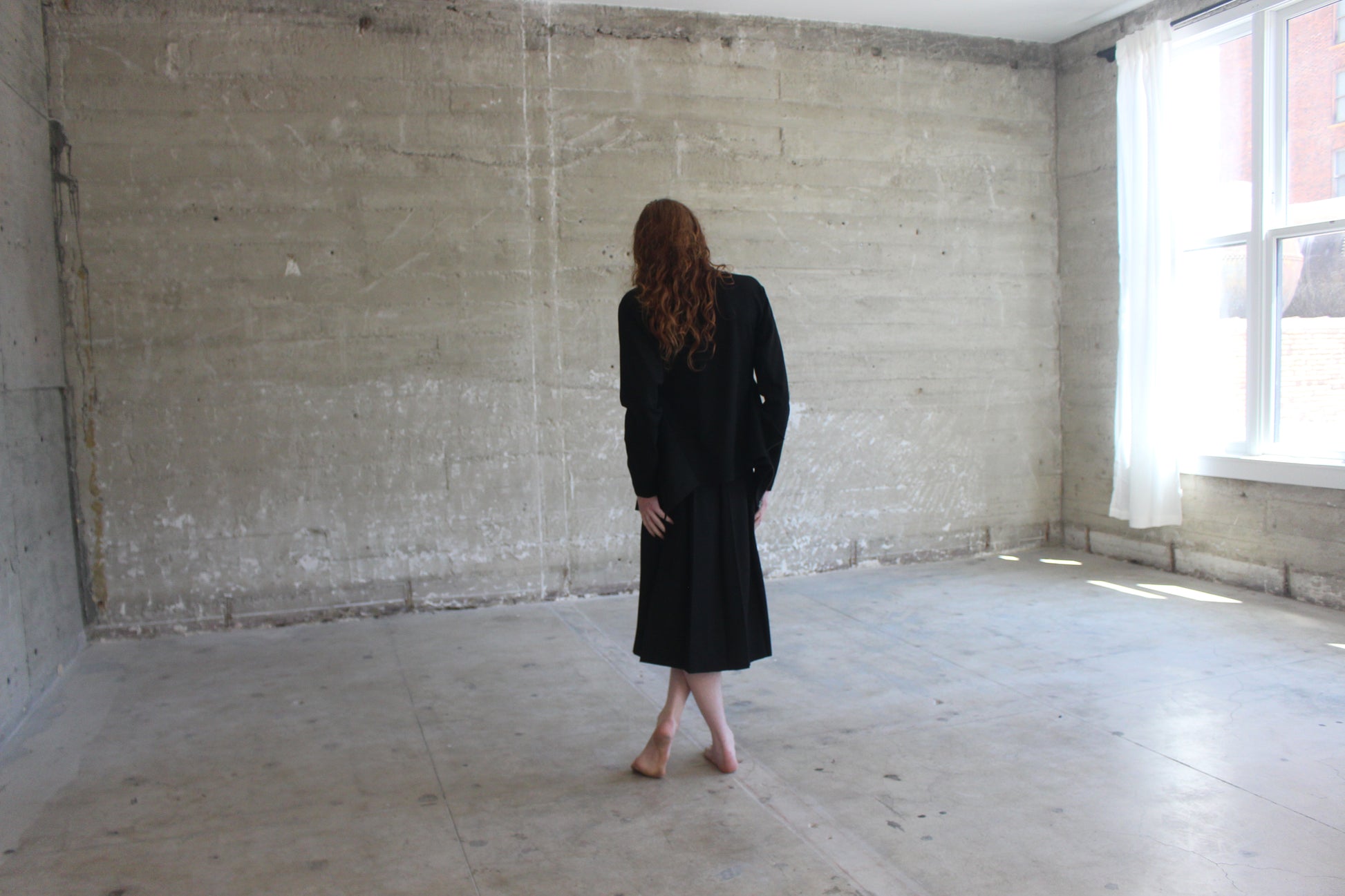 black jacket and skirt